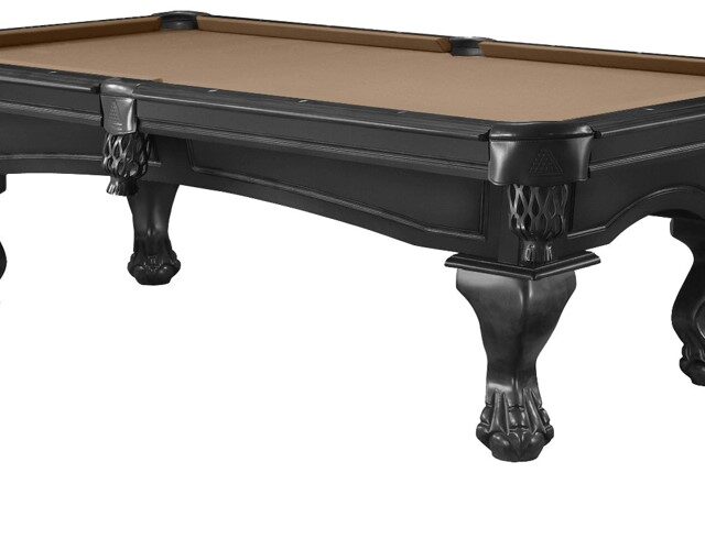 Classic pool table by Legacy for home game room design.